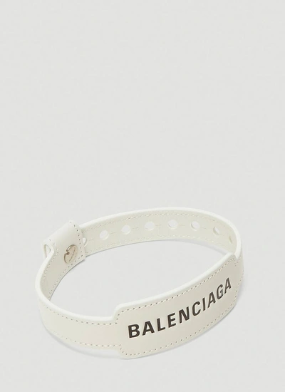 Shop Balenciaga Cash Logo Print Bracelet In White