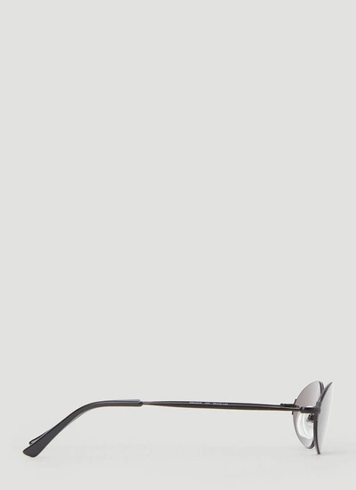 Shop Balenciaga Eyewear Invisible Oval Sunglasses In Black