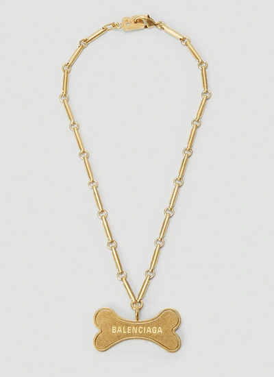 Shop Balenciaga Pets Bone Necklace In Gold