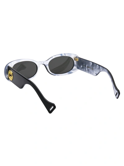 Shop Gucci Eyewear Oval Frame Sunglasses In Black