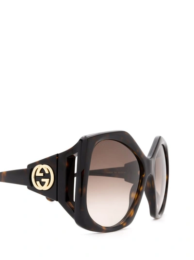 Shop Gucci Eyewear Hexagon Frame Sunglasses In Brown