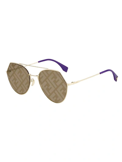 Shop Fendi Eyewear Aviator Sunglasses In Gold