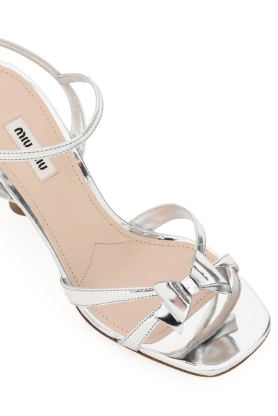 Shop Miu Miu Bow Detail Heeled Sandals In Silver