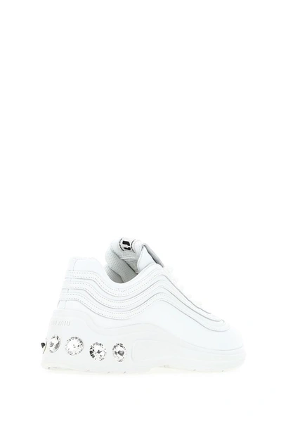 Shop Miu Miu Crystal Embellished Sneakers In White