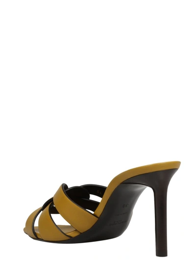 Shop Saint Laurent Tribute Heeled Mules In Yellow