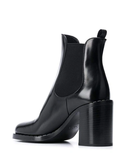 Shop Prada Block Heeled Chelsea Boots In Black