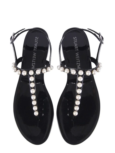 Shop Stuart Weitzman Goldie Jelly Embellished Flat Sandals In Black