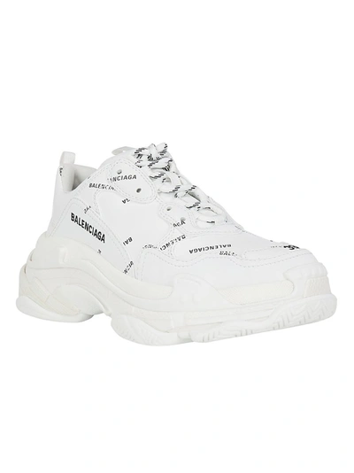 Shop Balenciaga Triple S Sneakers In White