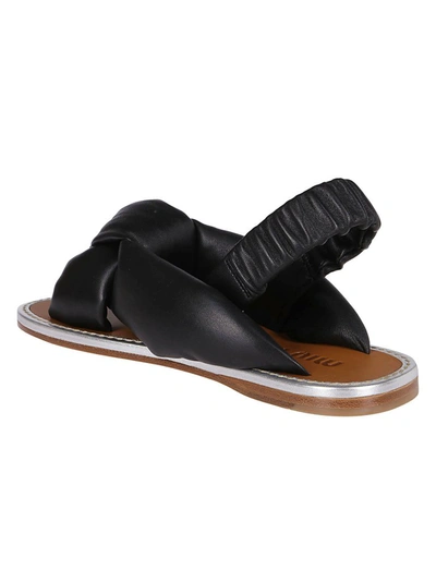 Shop Miu Miu Knotted Sandals In Black