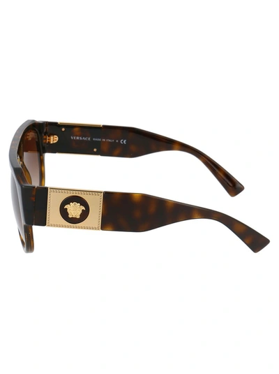Shop Versace Eyewear Pilot Frame Sunglasses In Brown