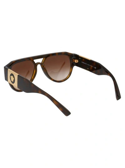 Shop Versace Eyewear Pilot Frame Sunglasses In Brown