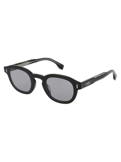 Shop Fendi Eyewear Oval Frame Sunglasses In Black