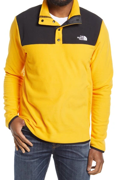 Shop The North Face Tka Glacier Snap Neck Pullover In Summit Gold/ Tnf Black