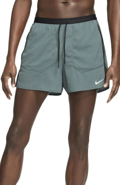 Shop Nike Flex Stride Run Division Running Shorts In Hasta/ Hasta/ Reflective Silv