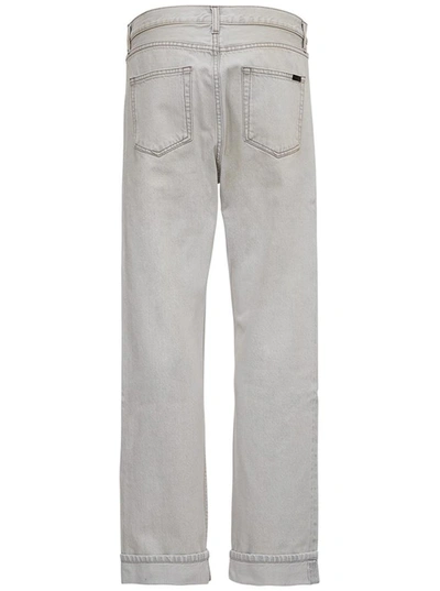 Shop Saint Laurent Straight Cut Jeans In Gray Denim In White