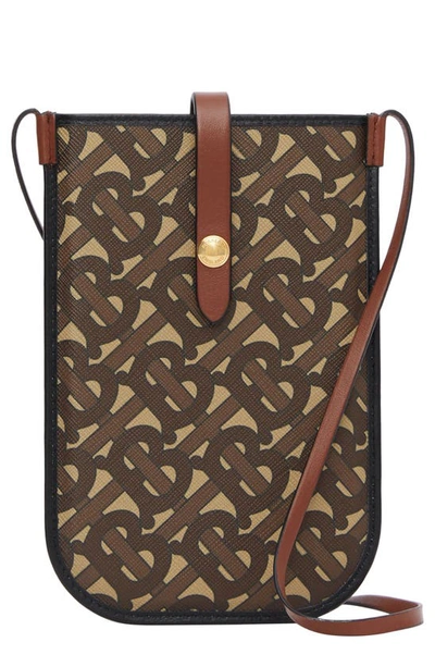 Shop Burberry Anne Monogram Print E-canvas & Leather Smartphone Crossbody Case In Bridle Brown