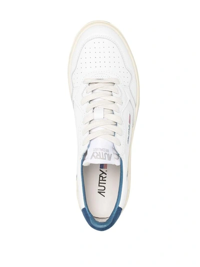 Shop Autry 01 Low Sneakers In White And Blue Leather