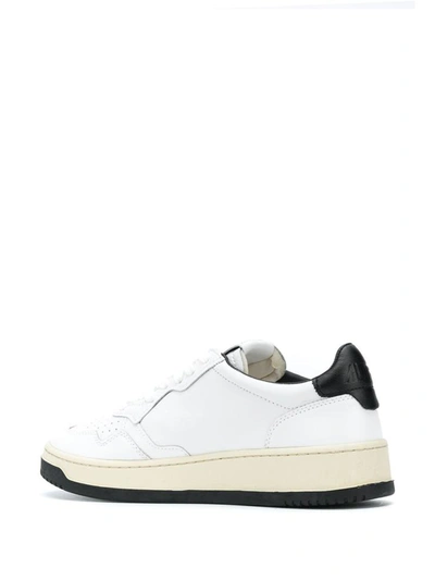 Shop Autry 01 Low Sneakers In White And Black Leather