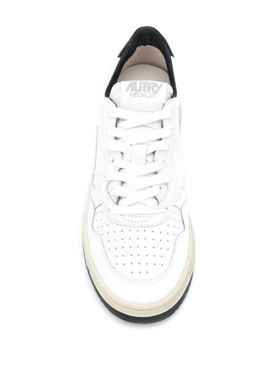 Shop Autry 01 Low Sneakers In White And Black Leather