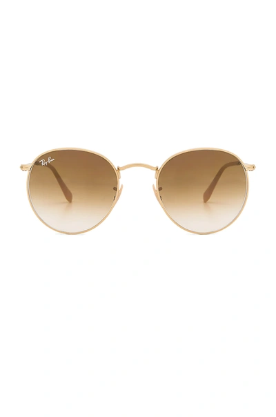 Shop Ray Ban Round Metal In Matte Gold & Clear Gradient Brown