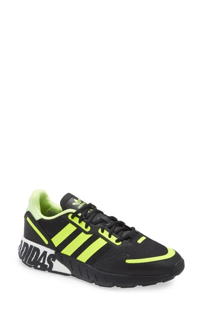 Shop Adidas Originals Zx 1k Boost Sneaker In Black/ Yellow/ Silver