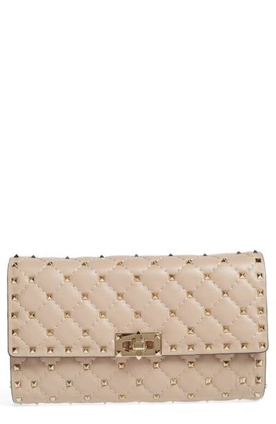 Shop Valentino Rockstud Matelassé Quilted Leather Crossbody Bag In Poudre