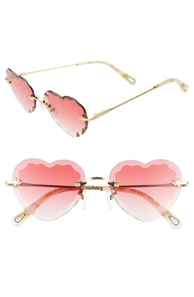 Shop Chloé Rosie 55mm Heart Shaped Sunglasses In Gradient Coral/ Gold