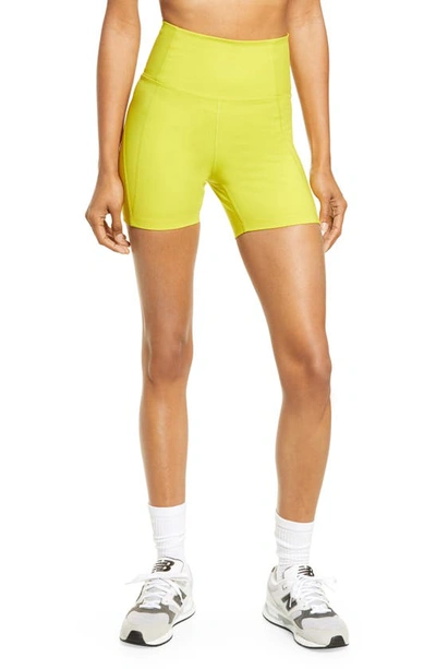 Shop Girlfriend Collective High Waist Running Shorts In Chartreuse
