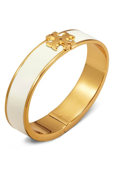 Shop Tory Burch Raised Logo Enamel Hinge Bracelet In New Ivory/ Tory Gold