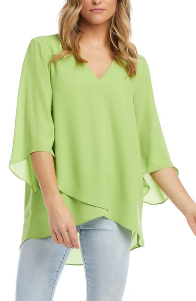 Shop Karen Kane Asymmetrical Crepe Top In Kiw