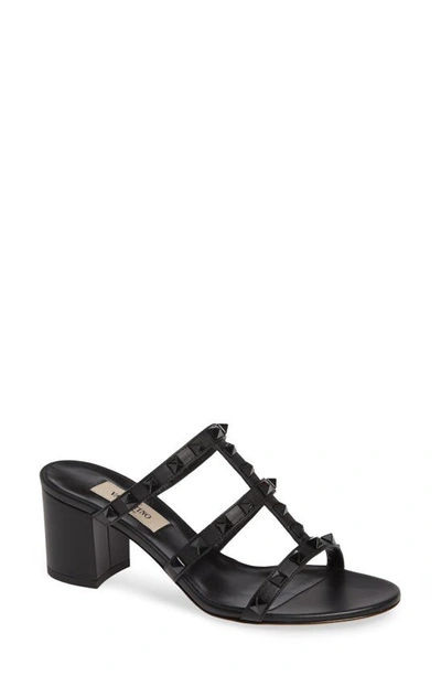 Shop Valentino Rockstud Slide Sandal In Black