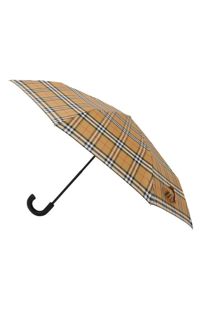 Shop Burberry Trafalgar Check Folding Umbrella In Archive Beige