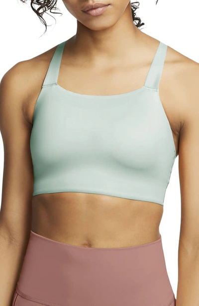 Shop Nike Swoosh Luxe Sports Bra In Teal Tint/barely Green