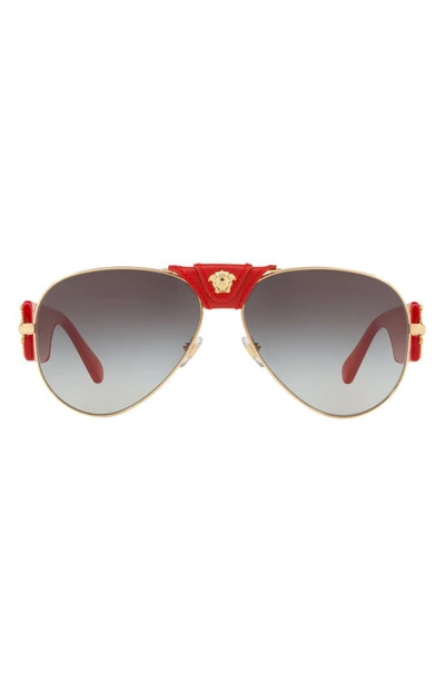 Shop Versace Medusa 62mm Aviator Sunglasses In Gold/ Red/ Grey Gradient