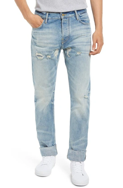 Shop Fear Of God 7th Collection Distressed Jeans In 5 Year Indigo Wash