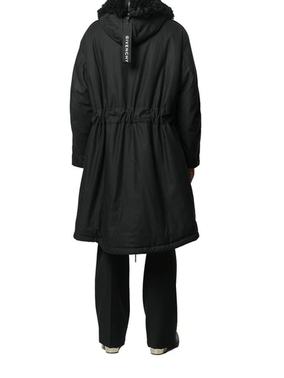 Givenchy Furry Hood Belted Parka Coat In Black