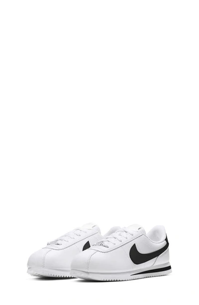 Shop Nike Kids' Cortez Basic Sl Sneaker In White/ Black