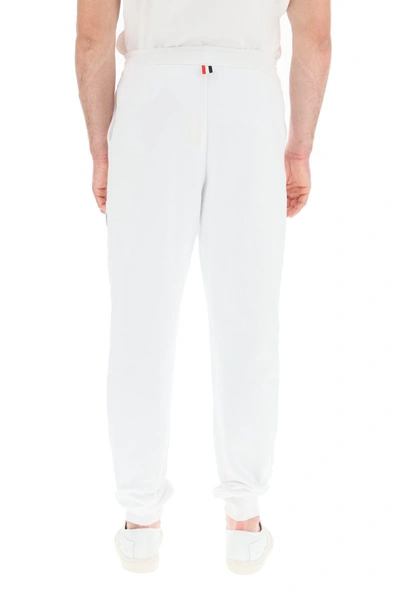 Shop Thom Browne Joggers With Diagonal Stripes In White