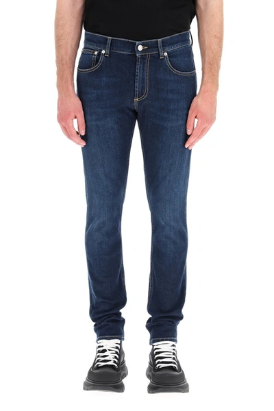 Shop Alexander Mcqueen Jeans With Logo Embroidery In Blu Washed