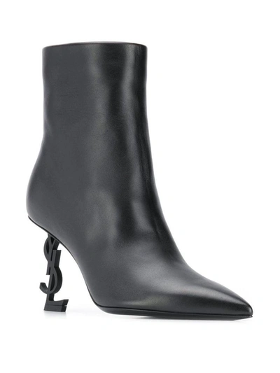 Shop Saint Laurent Opyum Ankle Boots In Black Leather