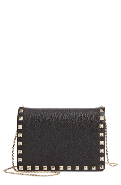 Shop Valentino Rockstud Leather Pouch Wallet On A Chain In Black/ Gold