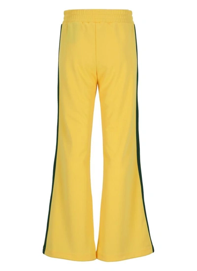 Shop Palm Angels Trousers In Yellow White