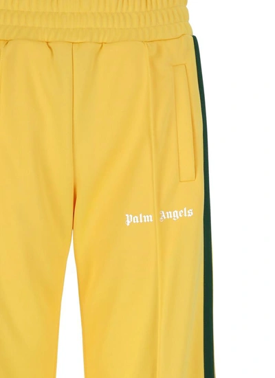 Shop Palm Angels Trousers In Yellow White