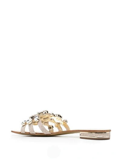 Shop Casadei Crystal-embellished Leather Slides In Gold