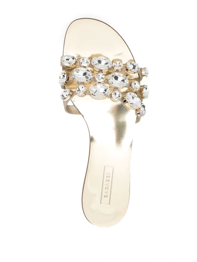 Shop Casadei Crystal-embellished Leather Slides In Gold