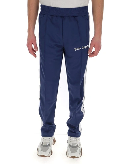 Shop Palm Angels Logo Print Track Pants In Blue