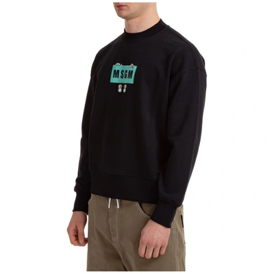 Shop Msgm Cartoon Logo Printed Sweatshirt In Black