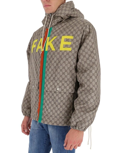 Shop Gucci Logo Printed Jacket In Beige