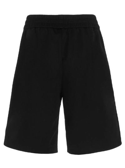 Shop Fendi Logo Patch Panelled Bermuda Shorts In Black