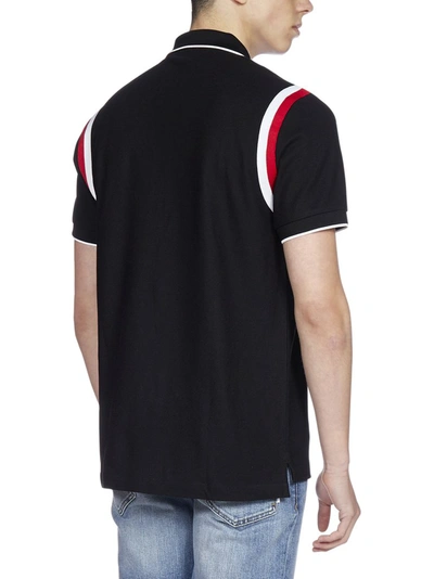 Shop Burberry Logo Appliqué Polo Shirt In Black